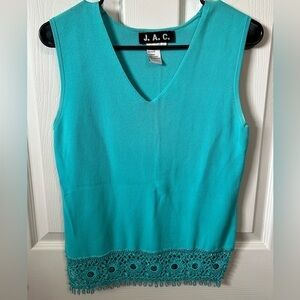 J.A.C. Sleeveless knit top with beading at the hem. Size L.
